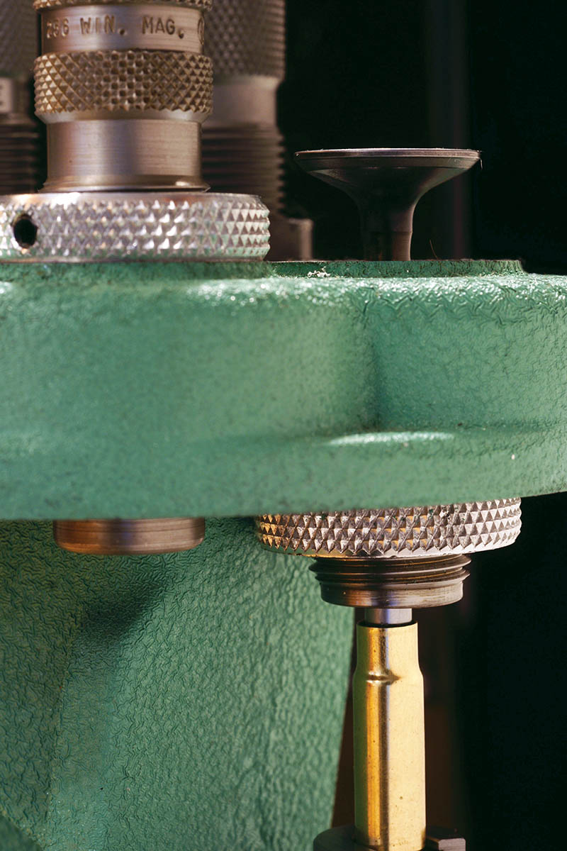 Employing an automotive valve with a .25-inch shaft to prevent neck buckling in the second forming die.